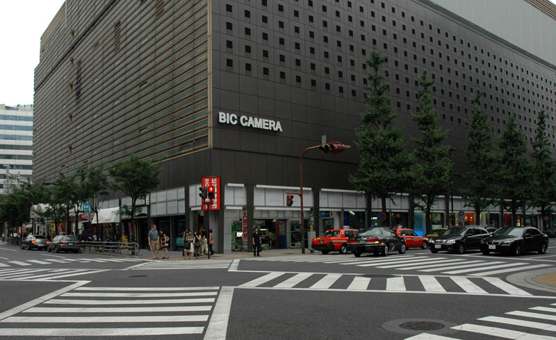 From top to several levels down, electronics, housewares, and cameras. The bottom floor is a subway station.